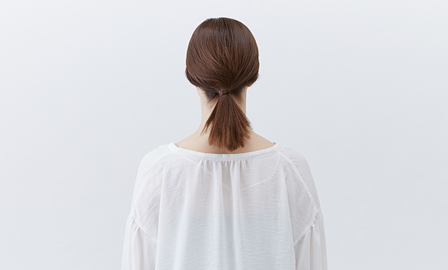 Tight ponytail style from behind 