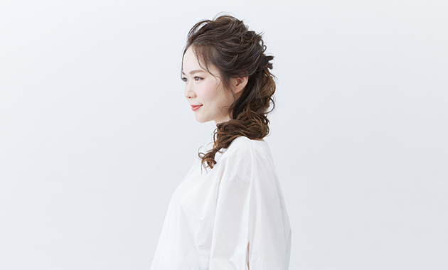 Loose braided style in profile 