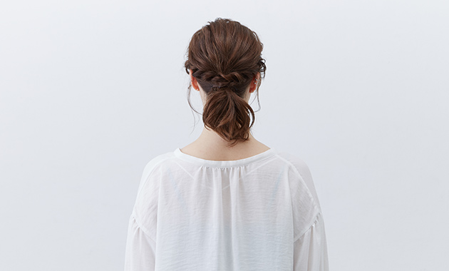 Low ponytail style from behind 