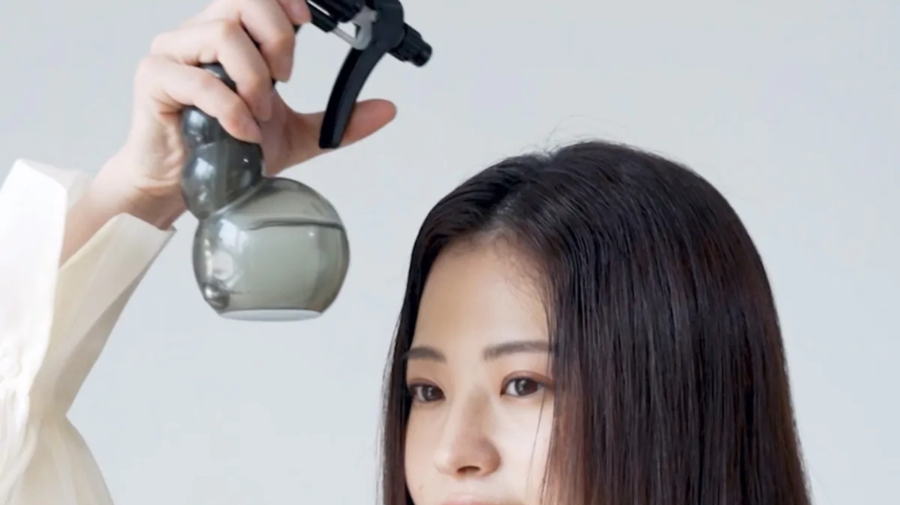 前髪を濡らす